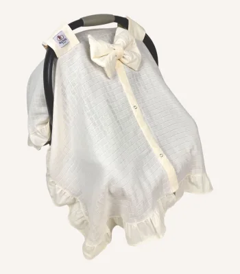 Krem müslin puset örtüsü, mini fiyonklu, ortadan yırtmaçlı çıtçıtlı model, akfil fırfırlı, tek kat hafif yazlık bebek puset örtüsü