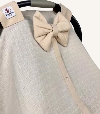 Bej müslin puset örtüsü, mini fiyonklu, ortadan yırtmaçlı çıtçıtlı model, akfil fırfırlı, tek kat hafif yazlık bebek puset örtüsü