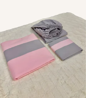 Pembe ve gri %100 pamuk tek kişilik nevresim takımı, lastikli çarşaflı, modern renk blok tasarımlı yatak seti